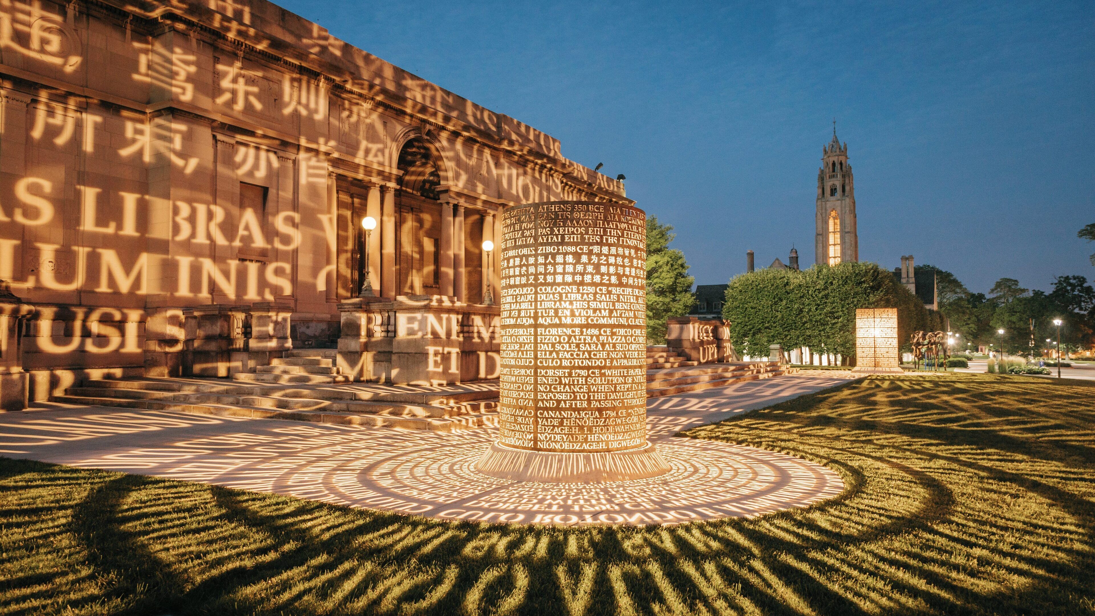 Memorial Art Gallery illuminated at dusk in Downtown Rochester, showcasing art and culture in New York