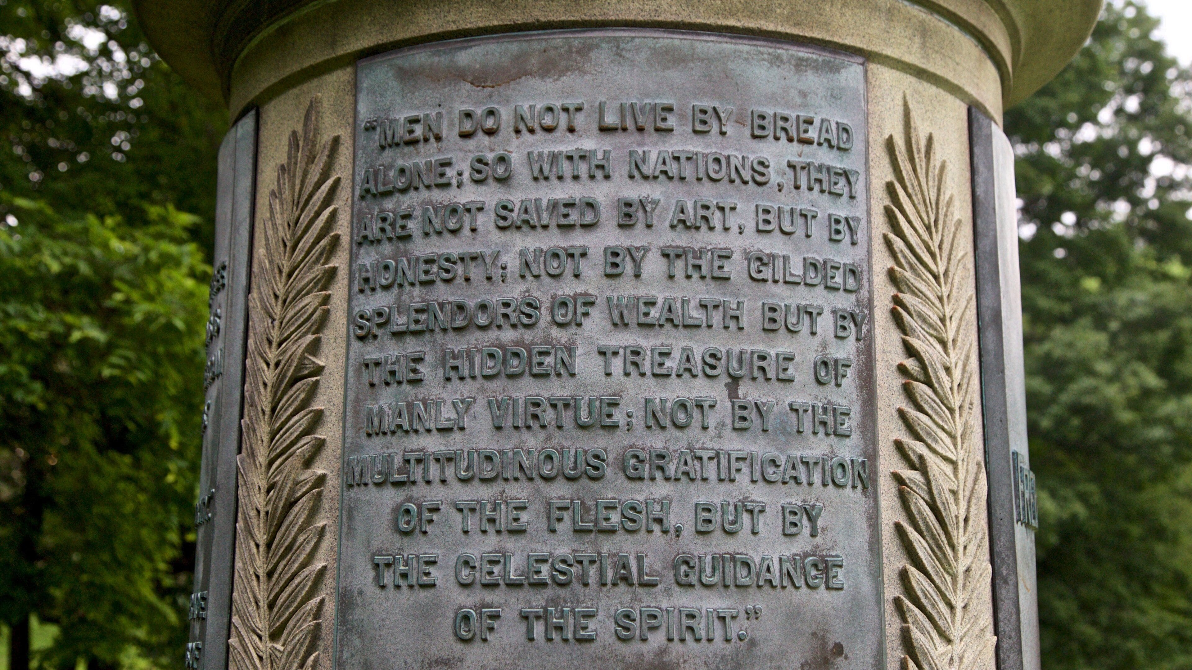 Frederick Douglass Statue which includes signage