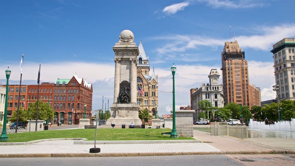 Clinton Square showing a city, heritage architecture and a garden