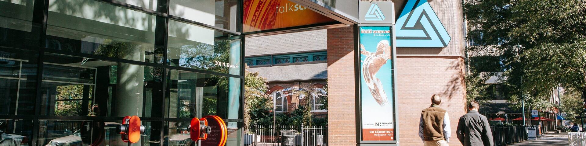 Discovery Place showing street scenes as well as a couple