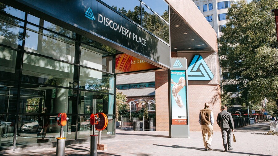 Discovery Place showing street scenes as well as a couple