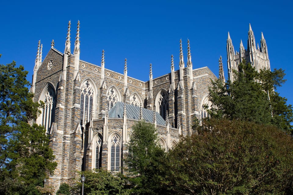 A large Gothic-style cathedral with intricate stonework and multiple spires.