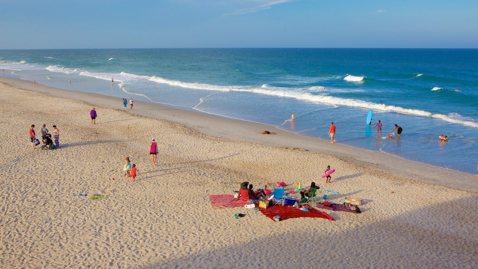 Wrightsville Beach featuring general coastal views and a beach as well as children