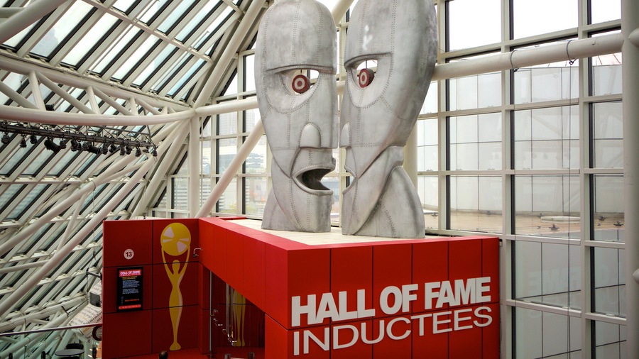 Rock and Roll Hall of Fame featuring music, interior views and signage