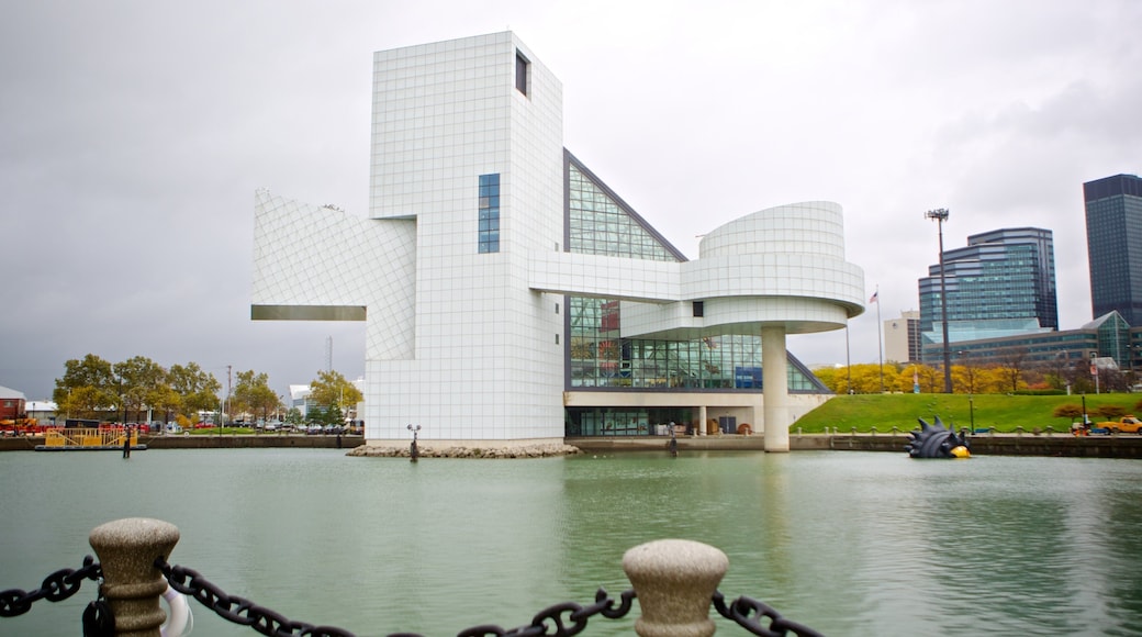 Rock and Roll Hall of Fame which includes modern architecture and a river or creek