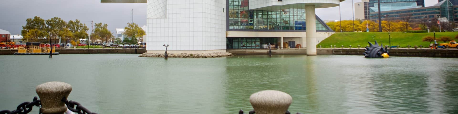 Rock and Roll Hall of Fame showing a river or creek and modern architecture