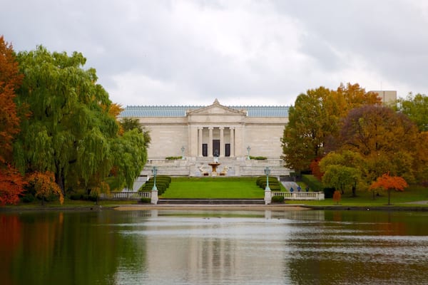 Cleveland Museum of Art which includes a pond, autumn leaves and heritage architecture
