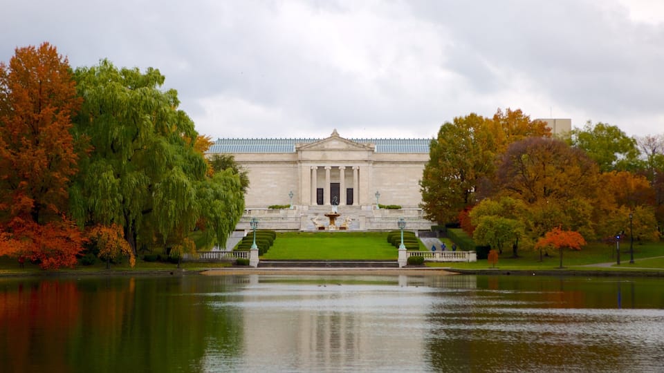 Cleveland Museum of Art which includes a pond, autumn leaves and heritage architecture