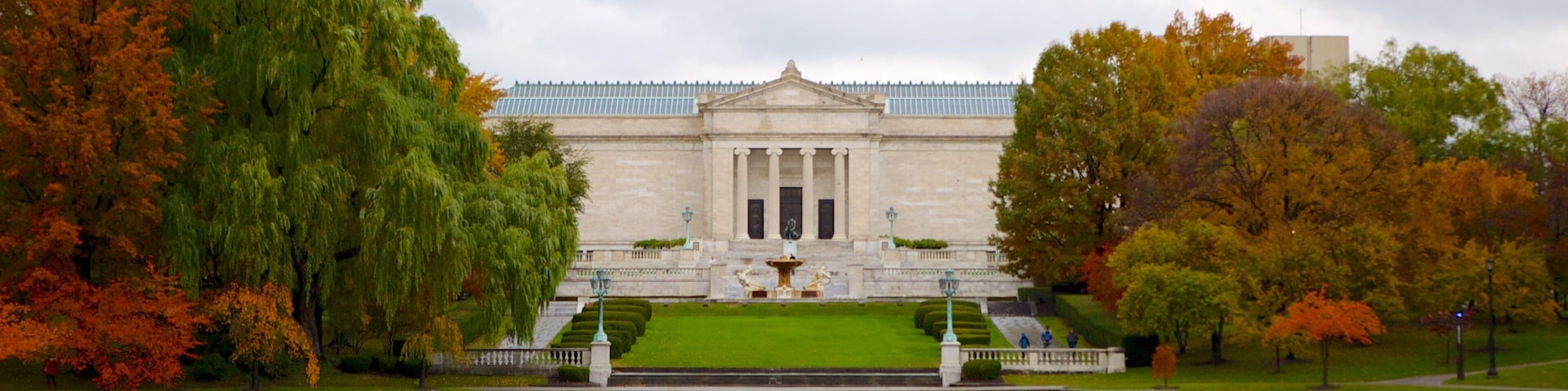 Cleveland Museum of Art which includes a pond, autumn leaves and heritage architecture