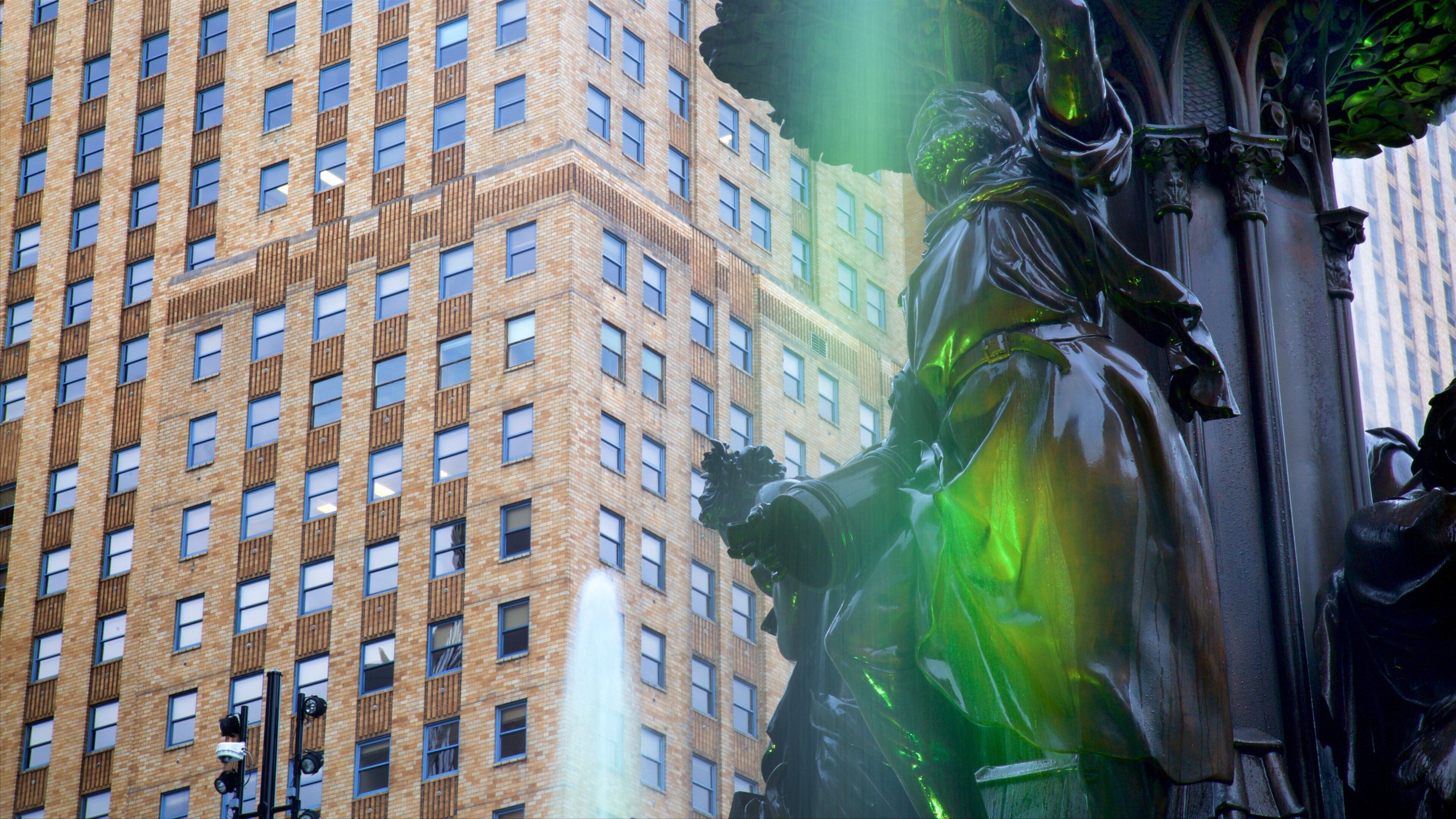 Fountain Square featuring a statue or sculpture
