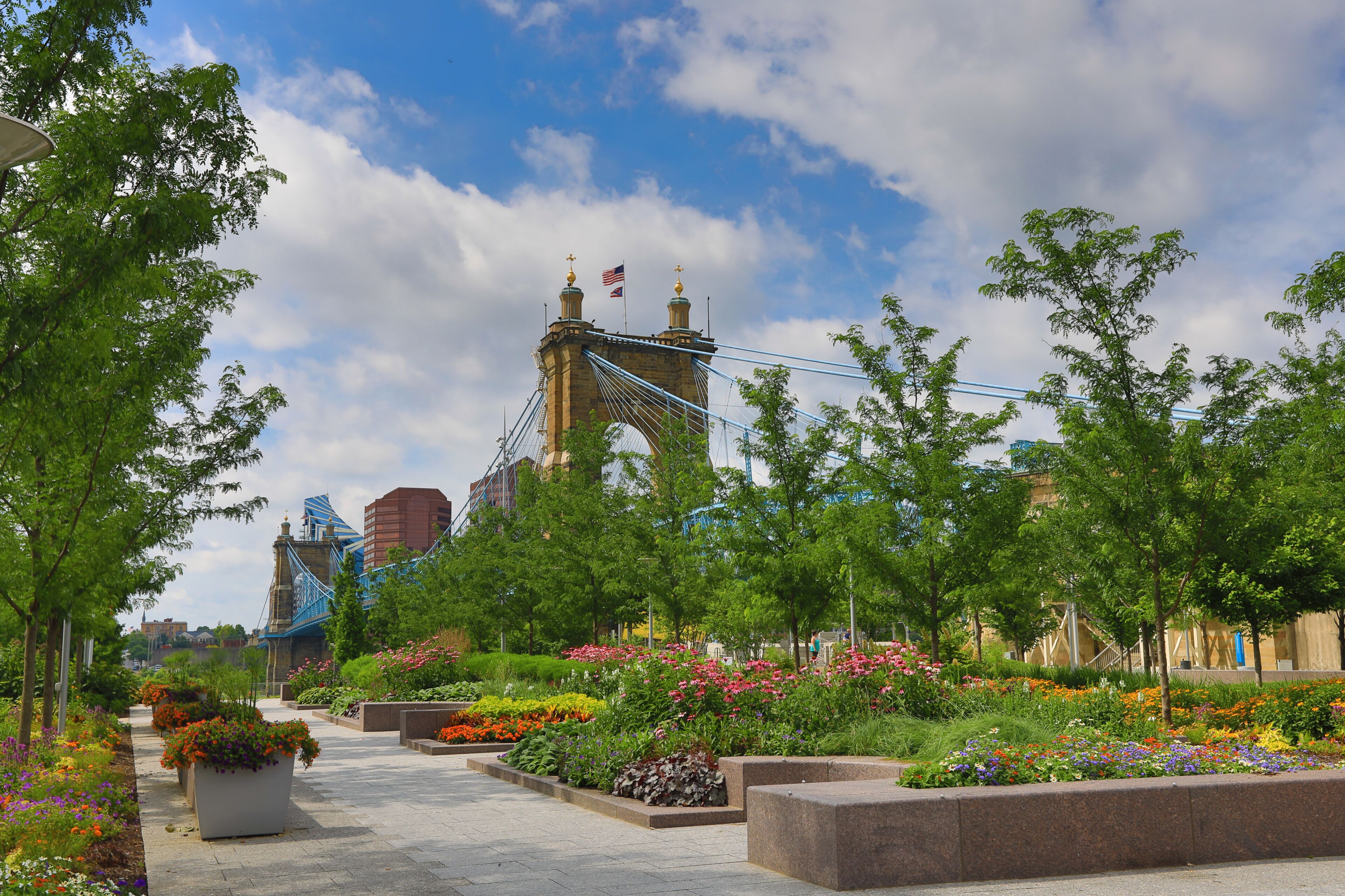 The John A. Roebling Bridge was built in 1866 to connect Covington Kentucky to Cincinnati , Ohio.  It spans the Ohio River.