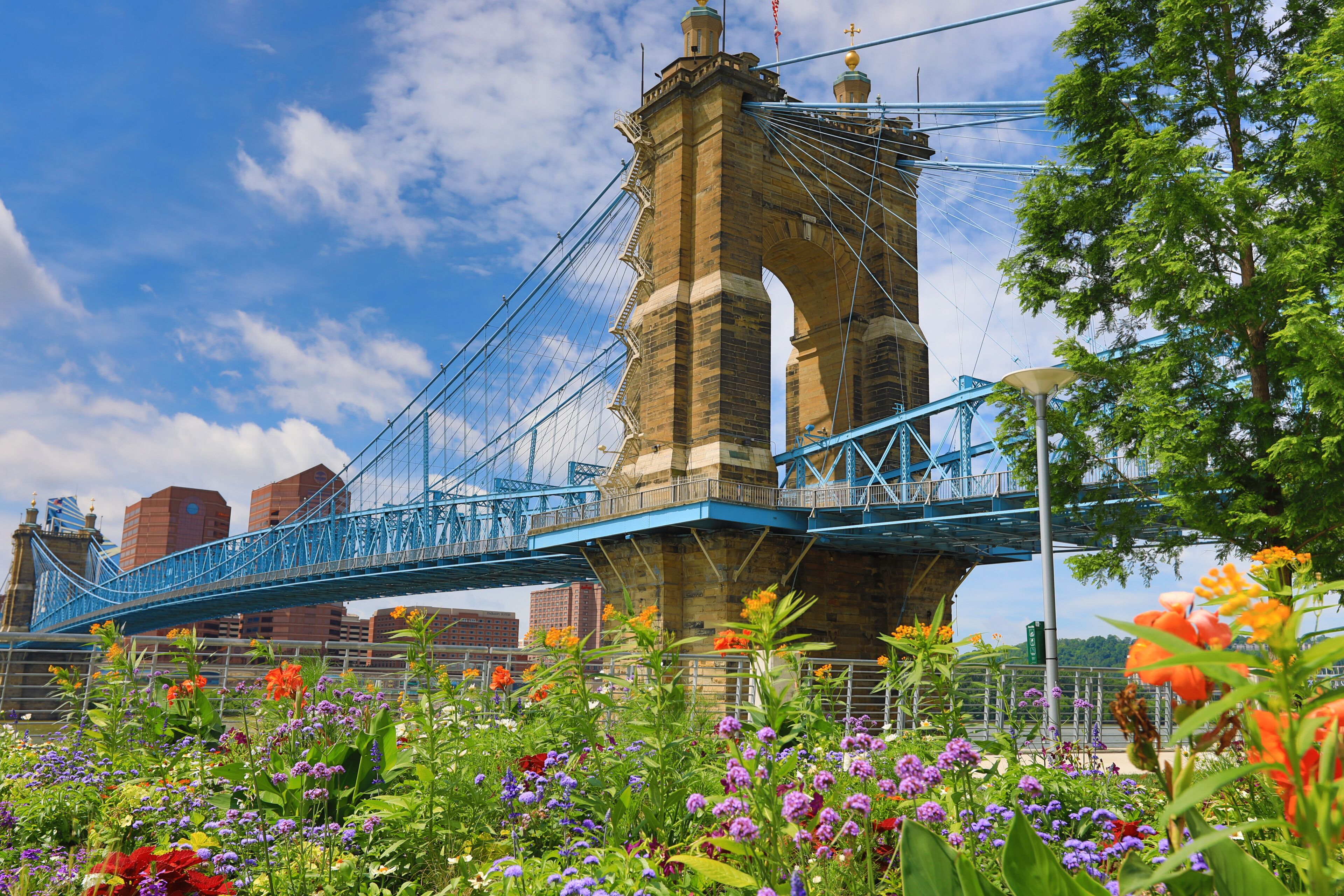The John A. Roebling Bridge was built in 1866 to connect Covington Kentucky to Cincinnati , Ohio.  It spans the Ohio River.