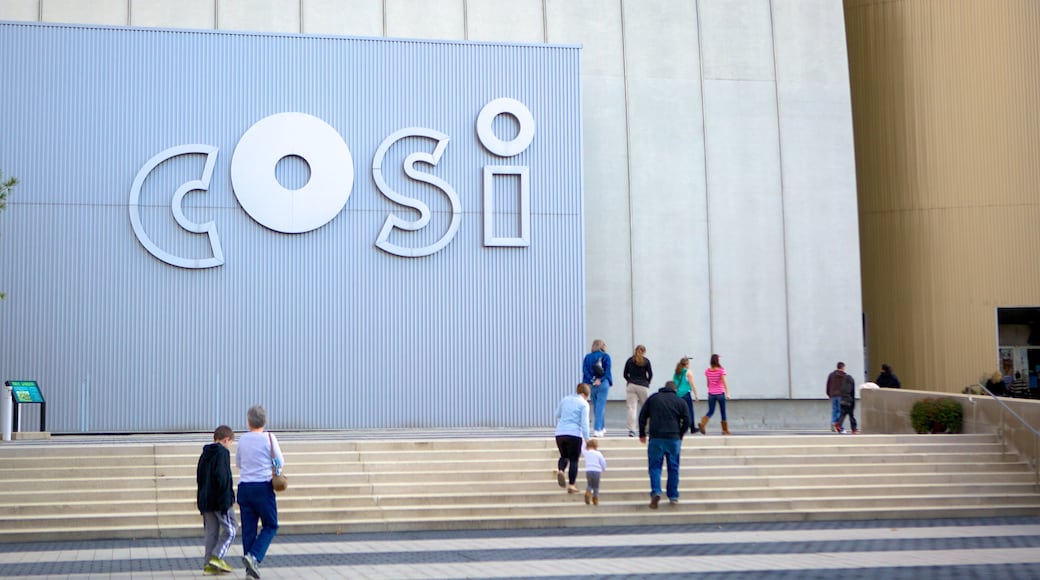 COSI featuring signage as well as a large group of people
