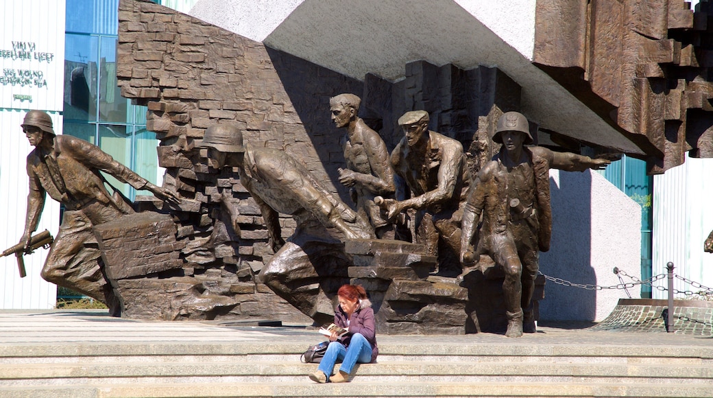 Monumento all\'insurrezione di Varsavia mostrando statua o scultura cosi come ragazza