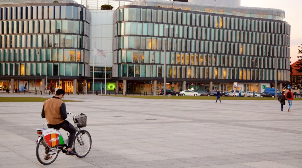 Pilsudski Square which includes a square or plaza and cycling as well as an individual male