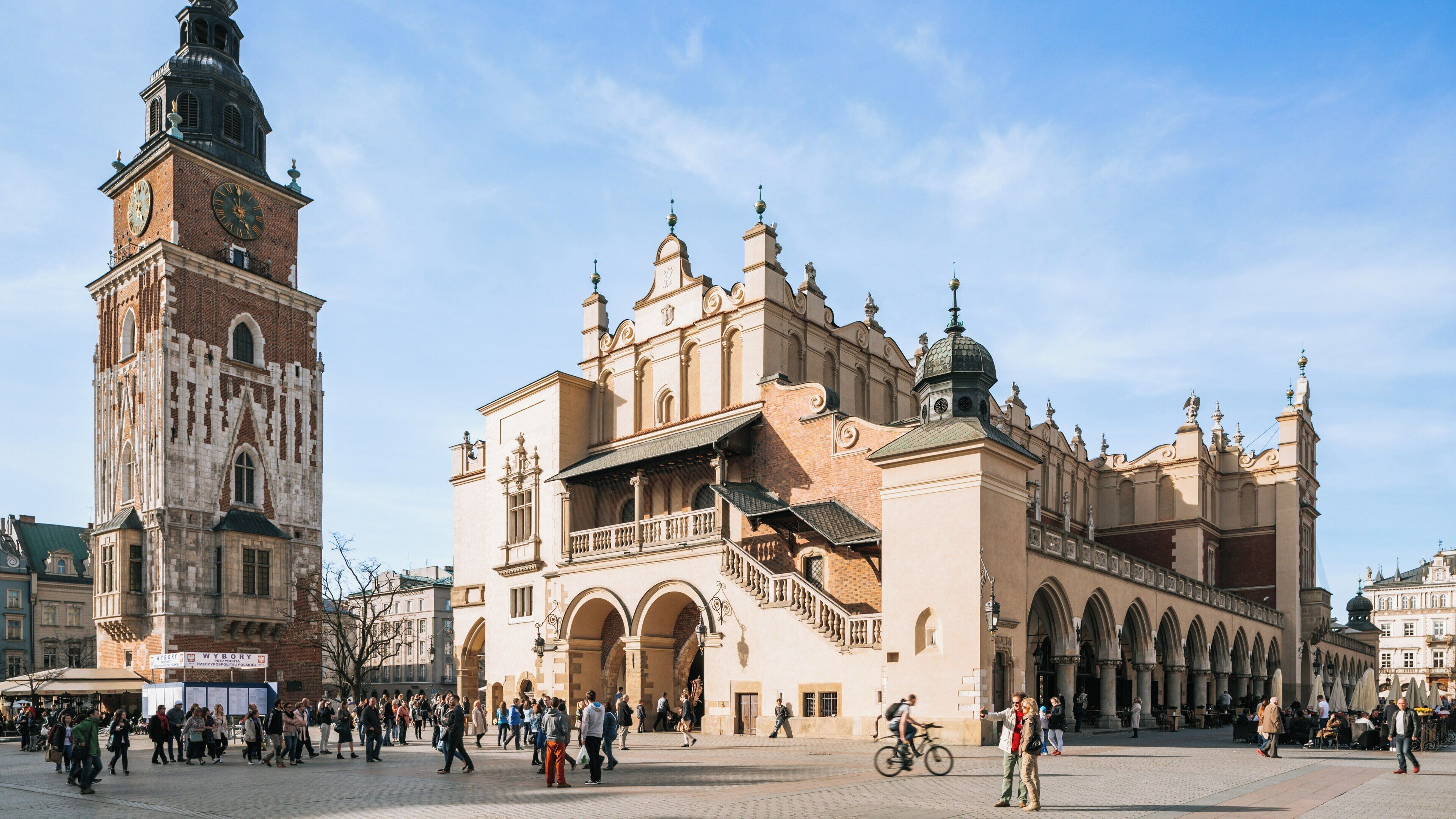 Cloth Hall in Kraków City Centre bustling with visitors and historic architecture in a vibrant atmosphere