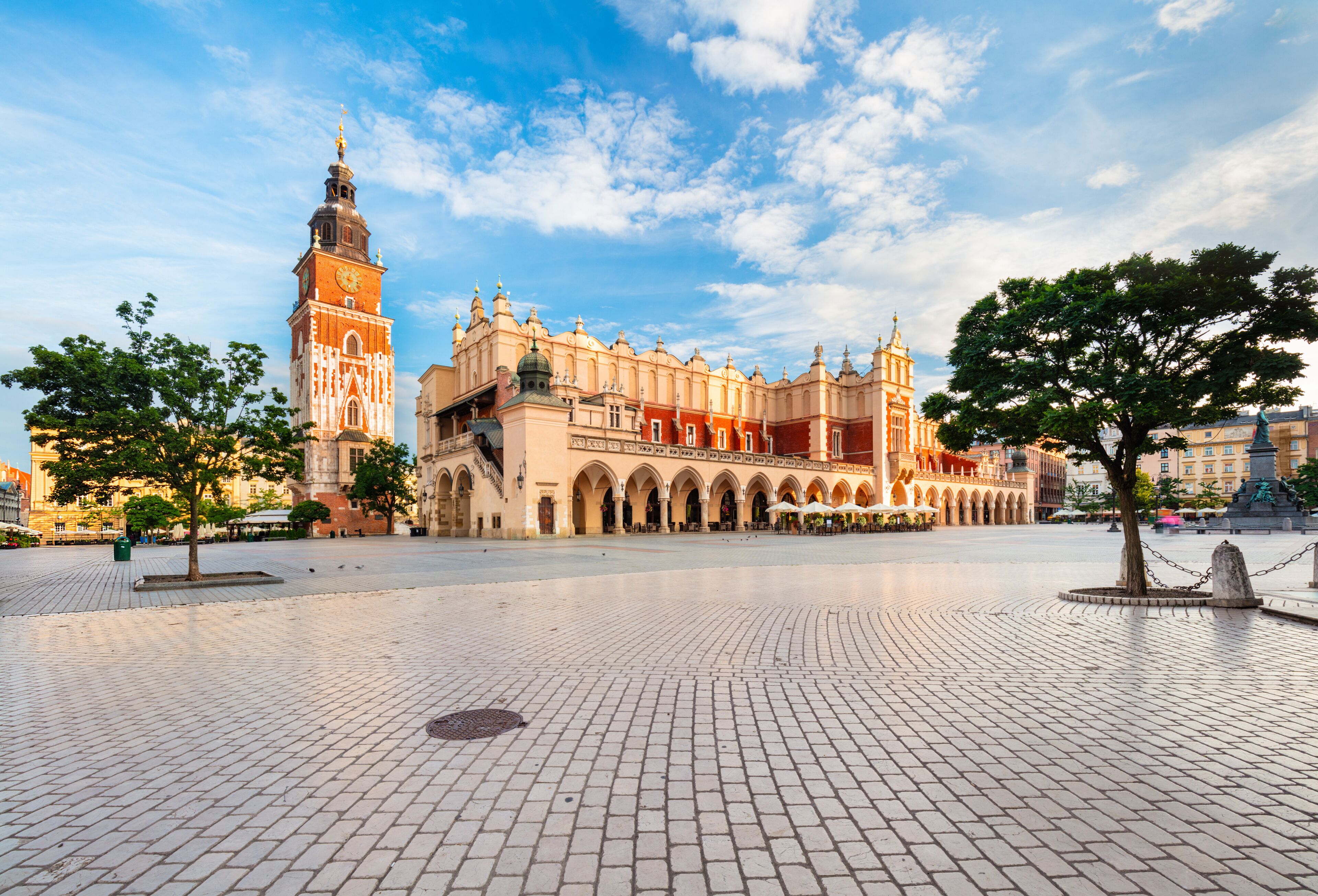 Old town and Cloth hall in Cracow, Poland, empty market square at sunrise