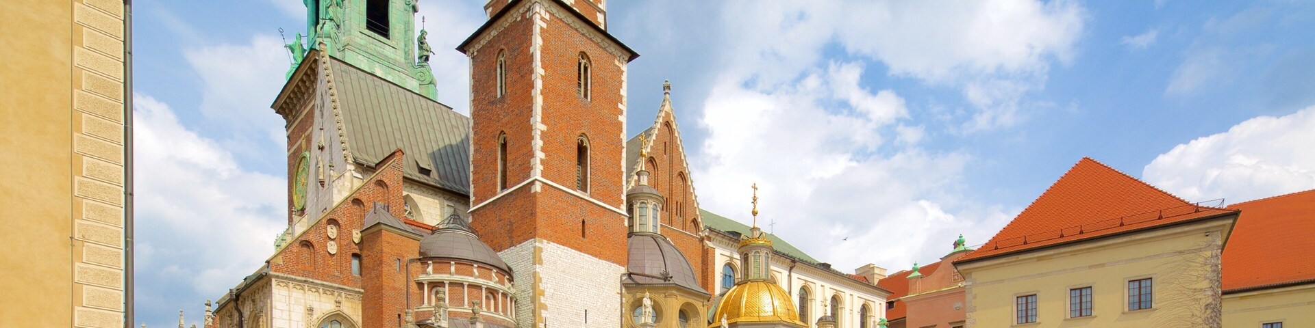 Wawel Cathedral showing a square or plaza and a city