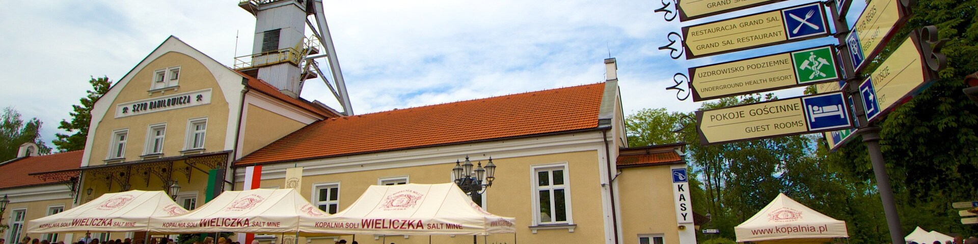Wieliczka Salt Mine showing signage, street scenes and a small town or village