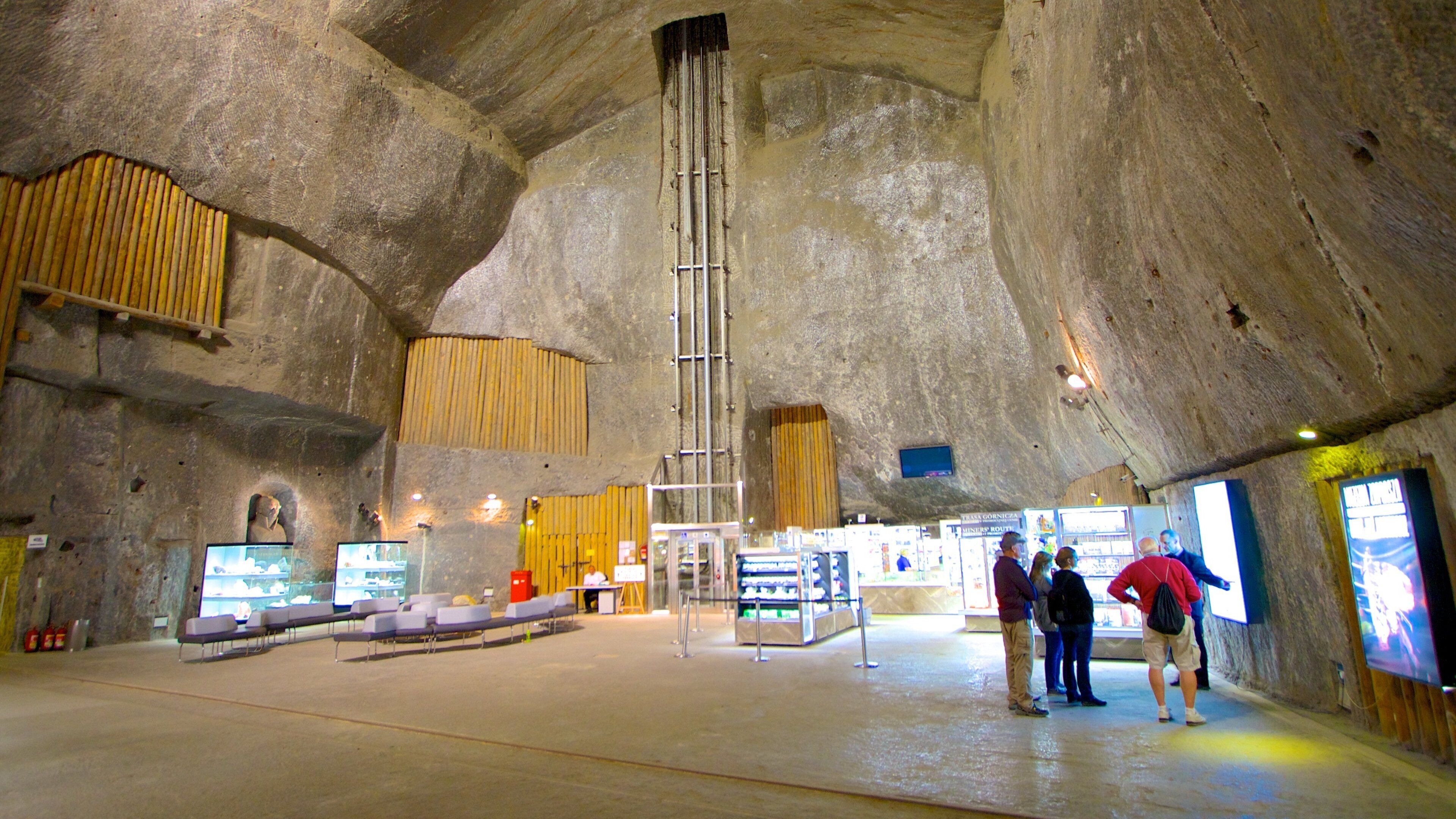 Wieliczka Salt Mine which includes caves and interior views
