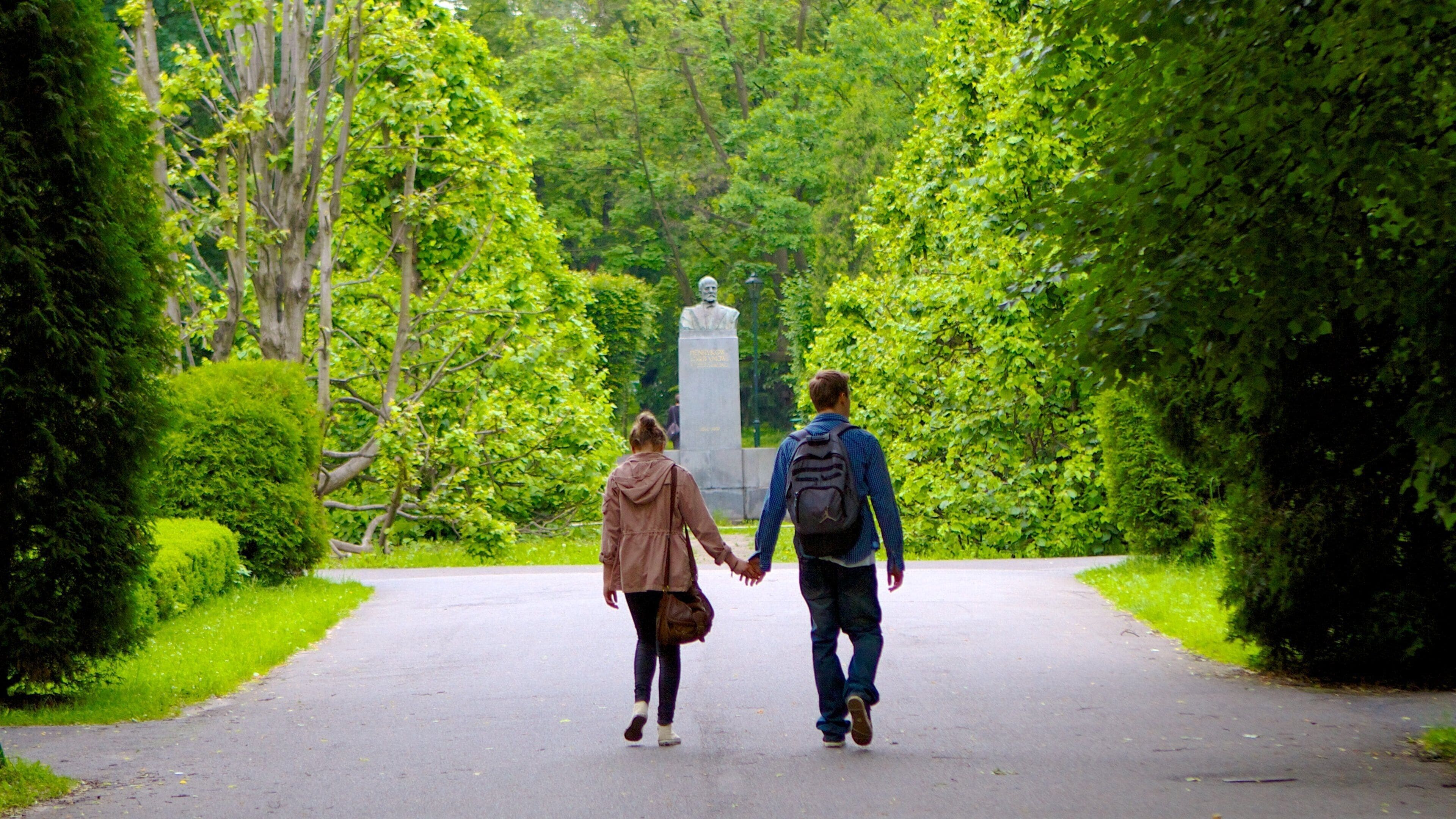 Jordan Park showing a statue or sculpture and a park as well as a couple
