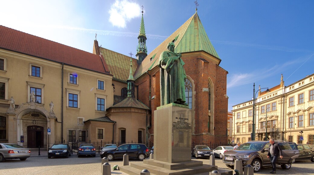 St. Francis of Assisi Church and Monastery featuring a square or plaza, a church or cathedral and a statue or sculpture