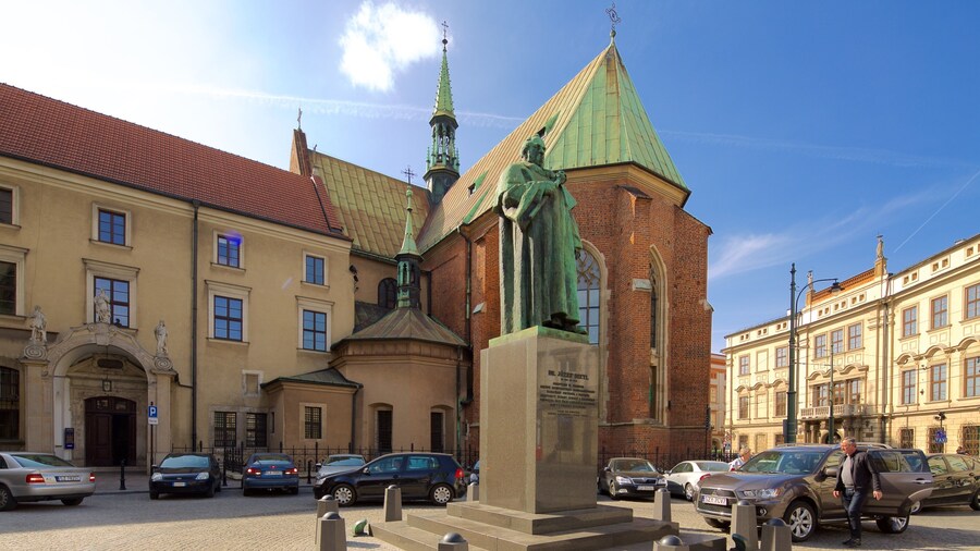 St. Francis of Assisi Church and Monastery which includes a statue or sculpture, a church or cathedral and a square or plaza