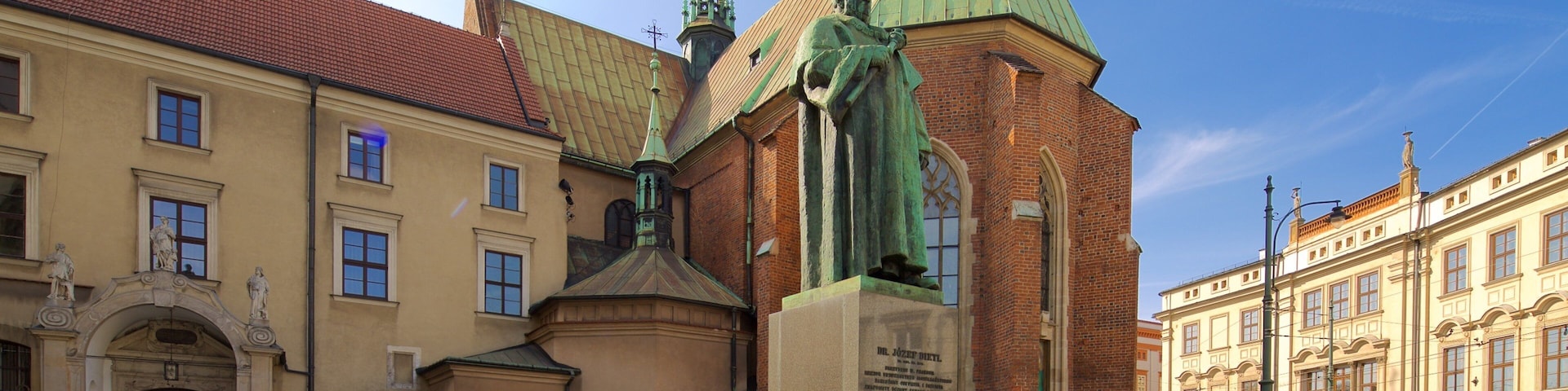 St. Francis of Assisi Church and Monastery which includes a statue or sculpture, a church or cathedral and a square or plaza