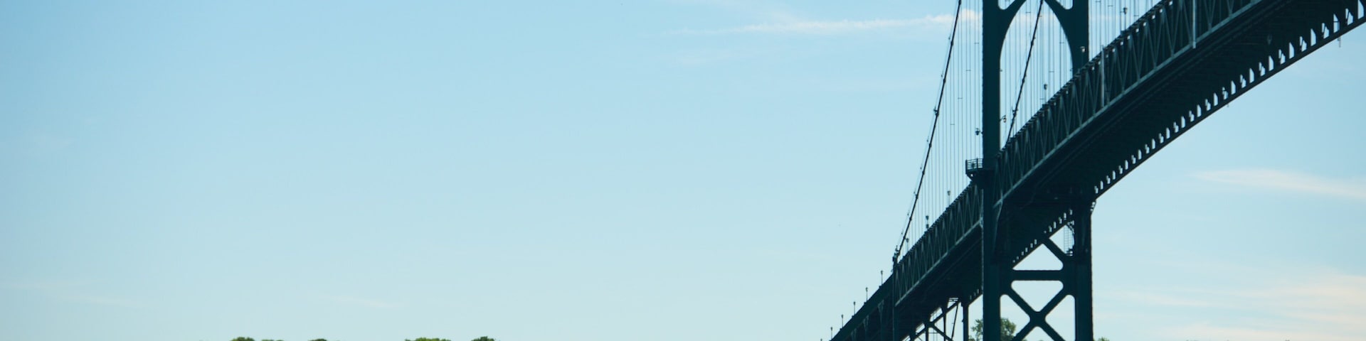 Newport Bridge featuring sailing, general coastal views and a bridge