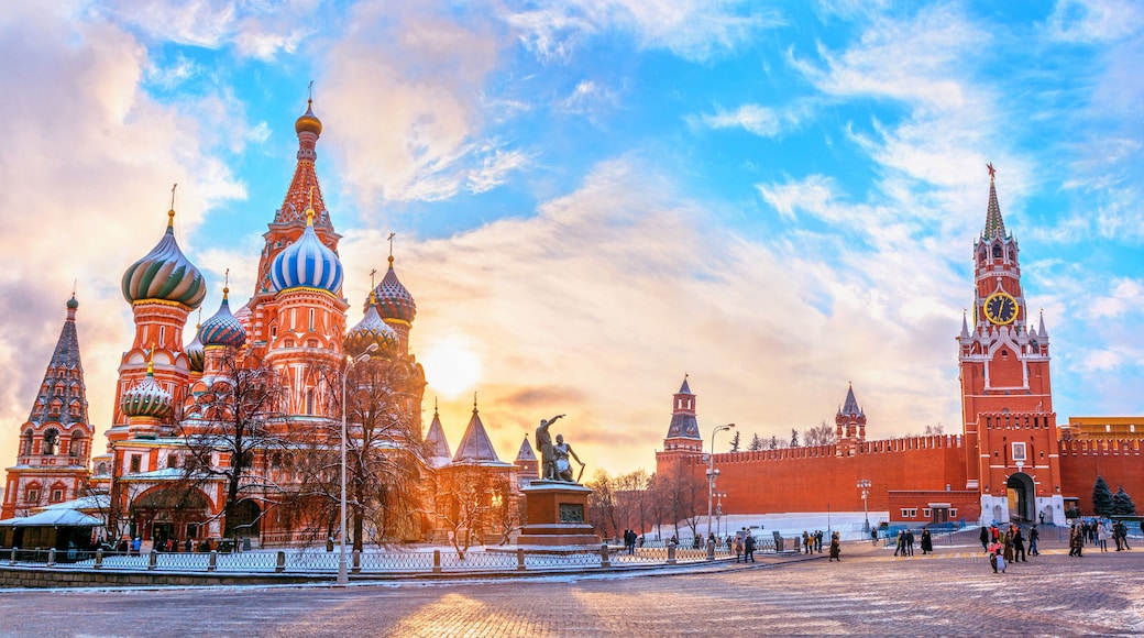 View of the Moscow Kremlin and Cathedral of St. Basil at the Red Square at sunset winter in Moscow, Russia