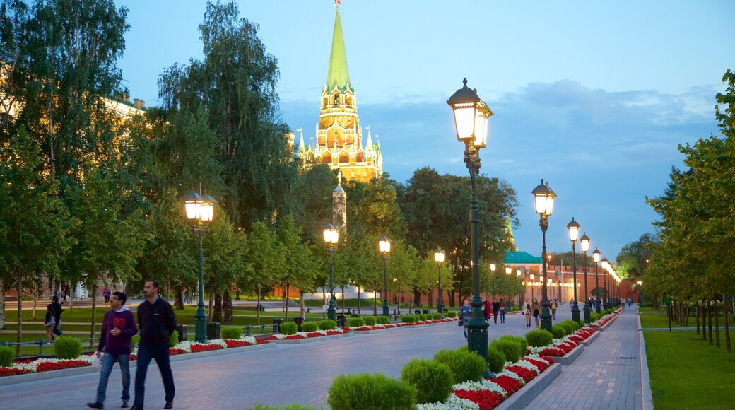 Alexander Gardens featuring a garden as well as a small group of people
