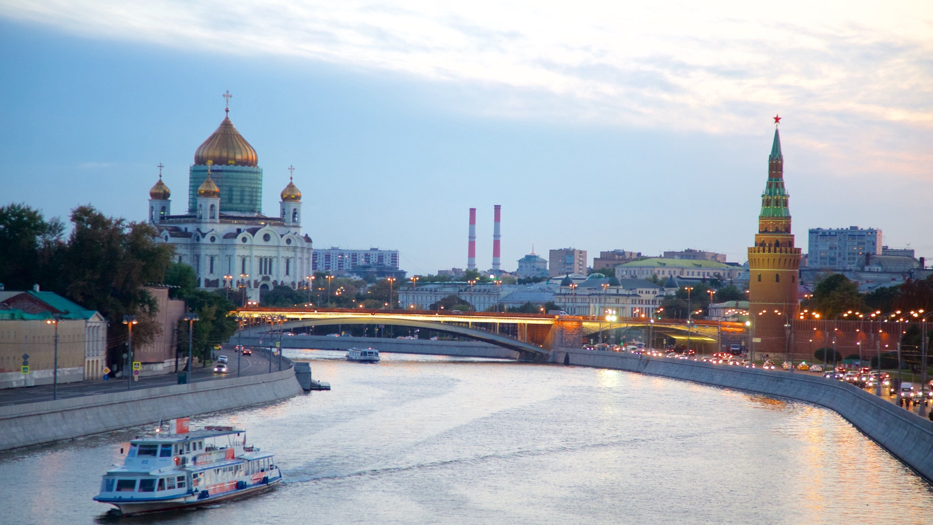 Cathedral of Christ the Savior showing a river or creek, a ferry and a city