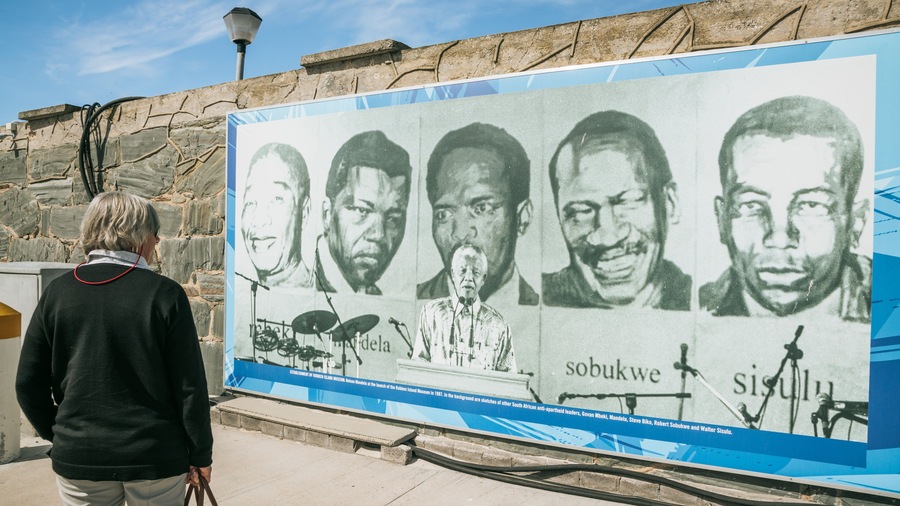 A historical mural with portraits of anti-apartheid leaders.
