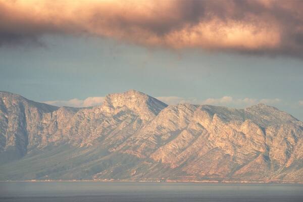Cape Point featuring a sunset