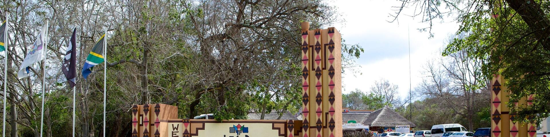 Lesedi Cultural Village which includes a small town or village and signage