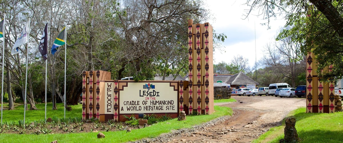 A sign welcoming visitors to Lese Di, a world heritage site.
