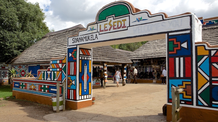 Lesedi Cultural Village which includes a small town or village and signage