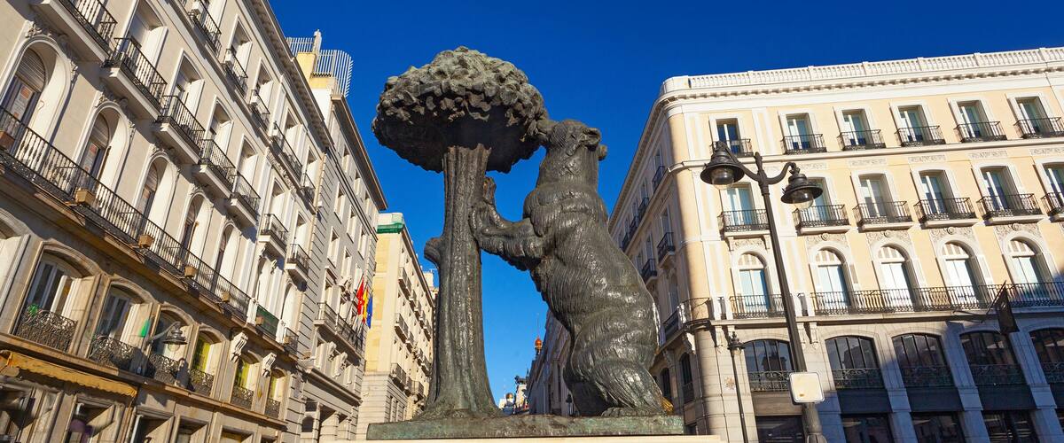 Bear and strawberry tree statue , the symbol of Madrid, in Puerta del Sol in Madrid, Spain.