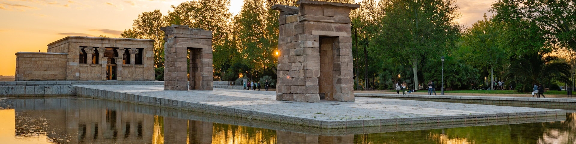 Temple of Debod featuring a temple or place of worship, heritage elements and a sunset