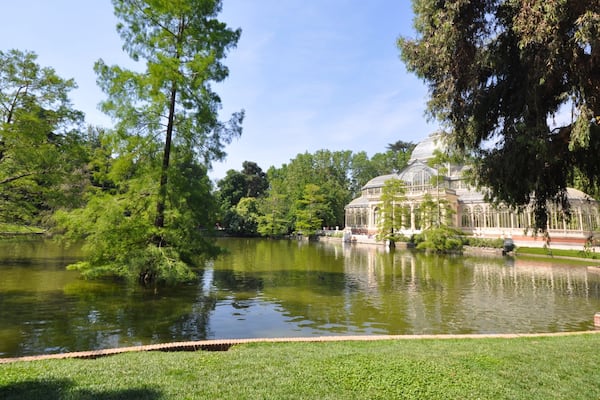 Glass Palace which includes a pond, a park and chateau or palace