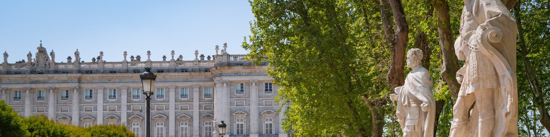 Plaza de Oriente showing a park, heritage architecture and a statue or sculpture
