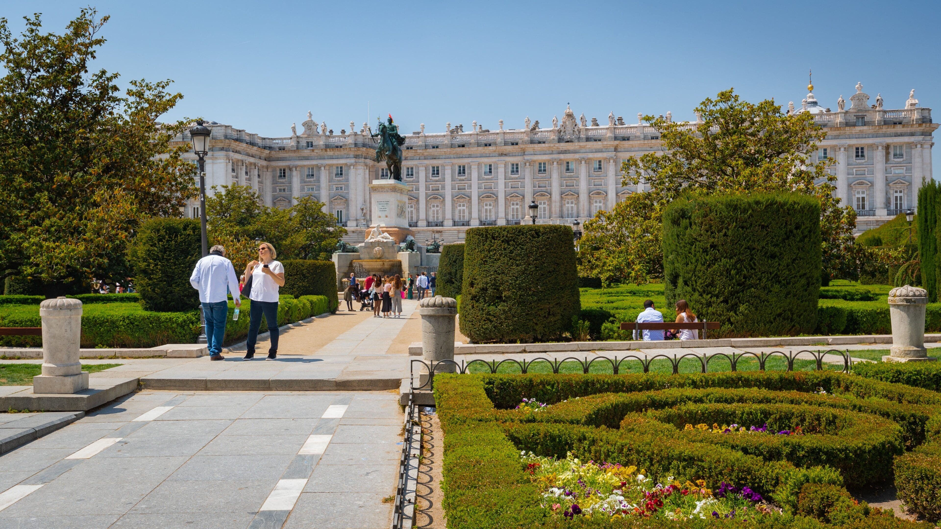 Plaza de Oriente which includes heritage architecture and a park
