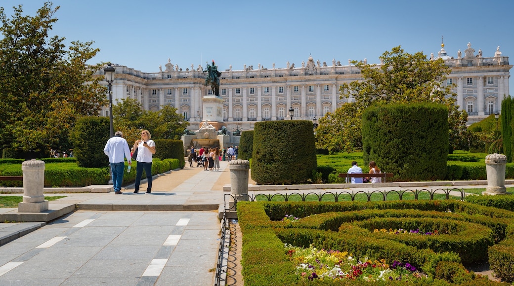 Plaza de Oriente which includes heritage architecture and a park
