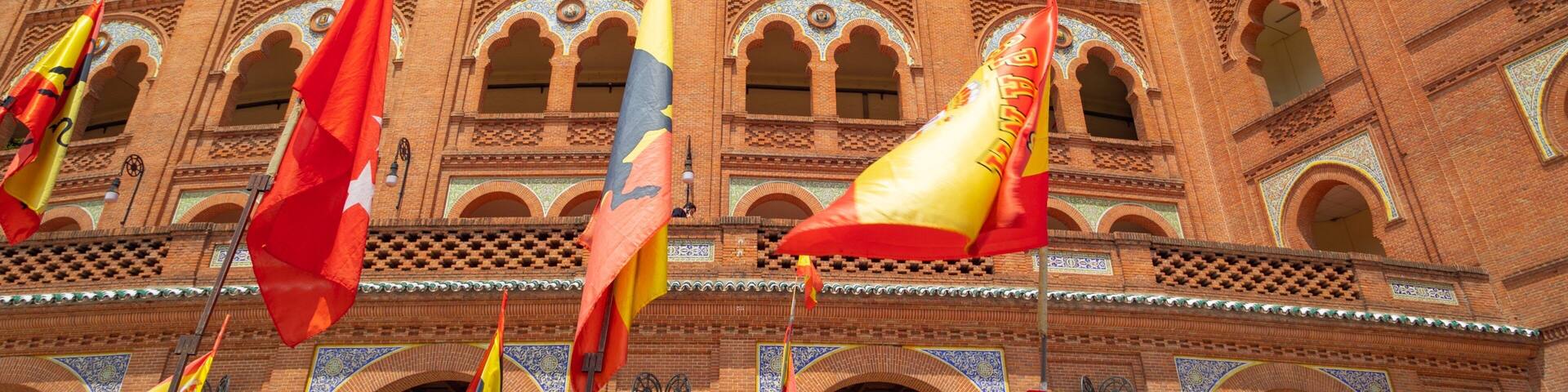 A historic building with intricate brickwork and arches.