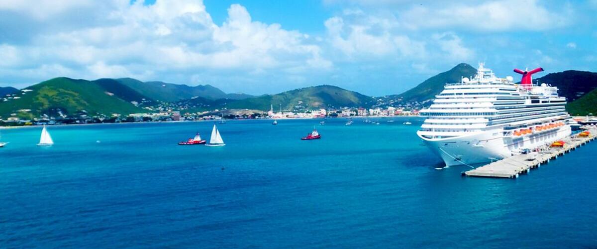 The Port of St Maarten is one of the most beautiful ports in the Caribbean. It is also one of the few ports in the region that can accommodate the Harmony of the Sea, which is currently the largest cruise ship in the world. 
Check out our visit to St Maarten:
http://travelwith2ofus.com/visiting-and-touring-st-maarten-st-martin-dutch-and-french-sides-in-one-day.php
Check out the most beautiful cruise ship ports in the #Caribbean: http://travelwith2ofus.com/the-most-beautiful-cruise-ship-ports-in-the-caribbean.php
#Cruise #StMaarten #Cruiseship #travel #SintMarteen #MahoBeach #Dutch #French #SImpsonBay #Lagoon #Marigot #Philipsburg #Blue
