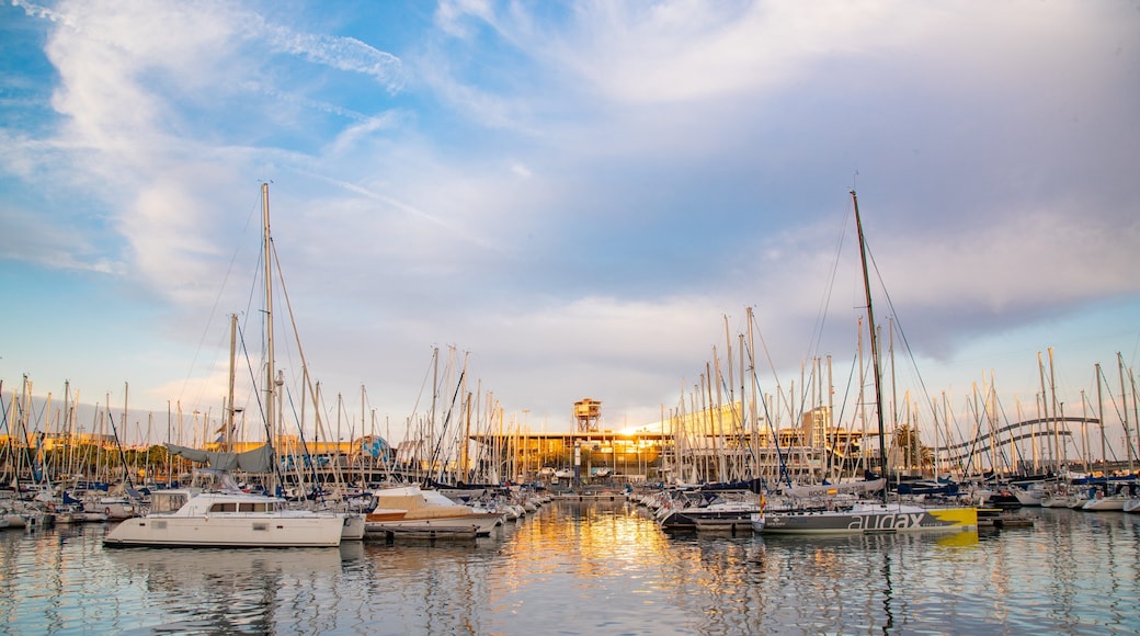 Port Vell which includes a sunset and a bay or harbor