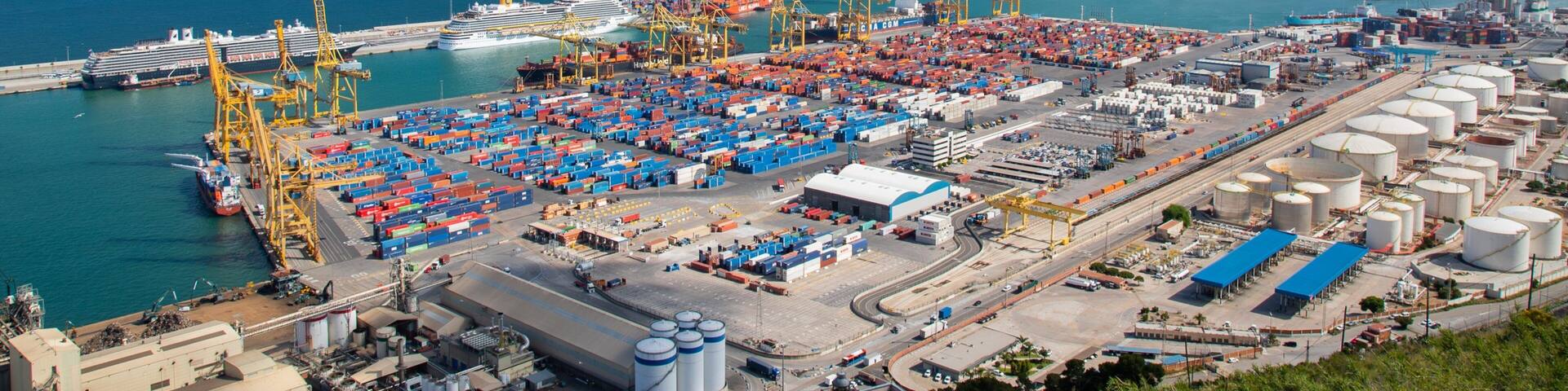 Montjuic Castle which includes general coastal views, landscape views and a marina