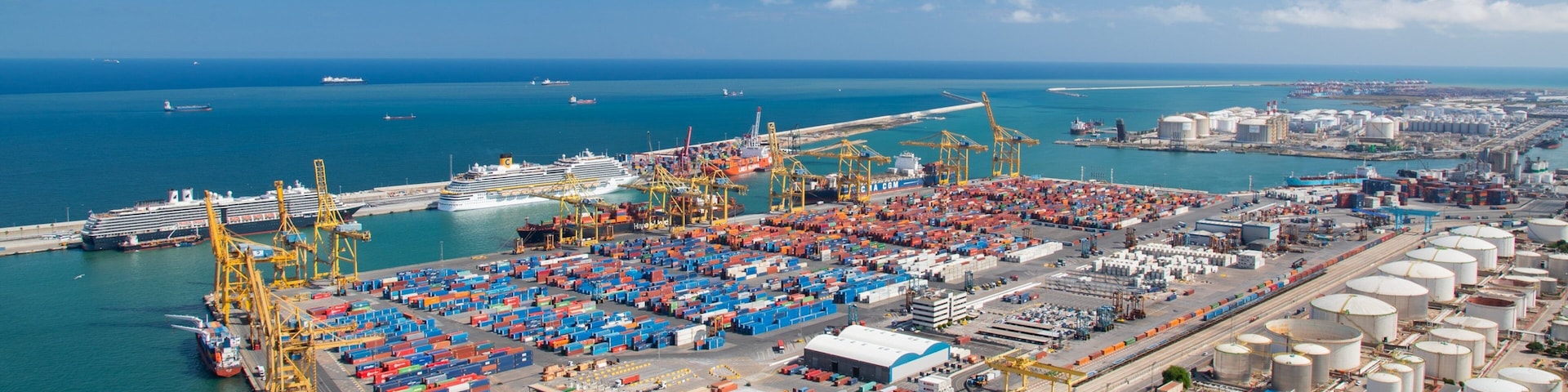 Montjuic Castle which includes general coastal views, landscape views and a marina