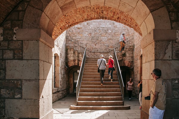 Montjuic Castle showing heritage elements as well as a couple