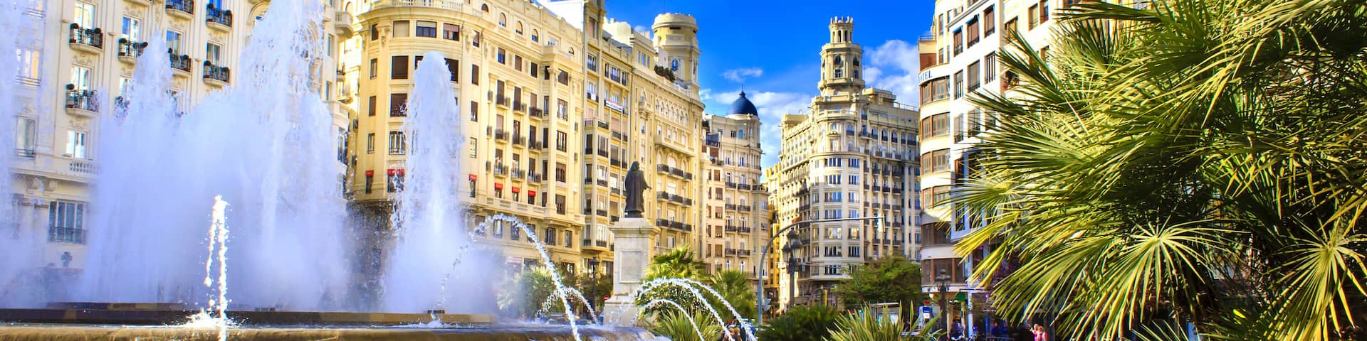 Main city square of Valencia, The Plaza del Ayuntamiento in bright afternoon colors, Spain